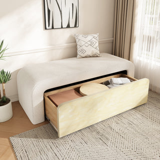 White upholstered boucle storage ottoman with a solid wood drawer
