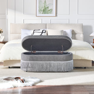 Oval Upholstered Storage Ottoman with Fringe Trim & Lift-Top Lid - 39'L x 16'W x 17'H, Multi-Functional Footrest & Hidden Storage for Living Room or Bedroom - Grey Fabric with Metal Frame