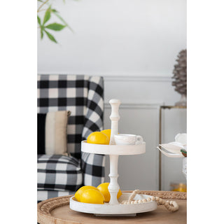 Add a touch of elegance to your home with this D11.8 x 15.4" Two-Tiered Round Wooden Tray in white. Perfect for organizing and displaying items, this versatile tray features two levels for efficient storage, making it ideal for use on coffee tables, countertops, or as a serving tray. The sleek white finish and wooden construction offer both durability and a modern aesthetic, seamlessly complementing various home decor styles. Use it to display decor, store essentials, or serve drinks and snacks at gathering