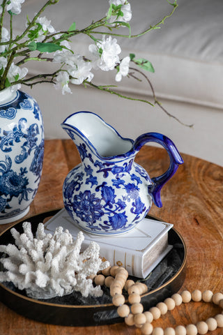 Blue and white porcelain milk jug vase with handle